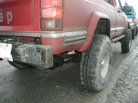1985 Ford Bronco - Doug hit his right rear rocker.
