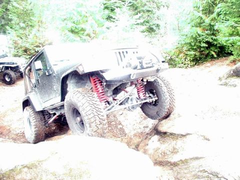 1985 Ford Bronco - Clint climbing the rock.