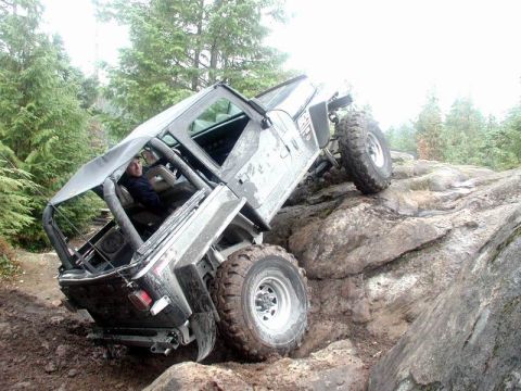 1985 Ford Bronco - With a quick burp of the injected 302, Jason finds himself ready to roll (over). We had to hook up a strap to his front bumper with a few m…