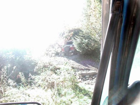 1985 Ford Bronco - Doug coming out of a creek crossing under the powerlines.