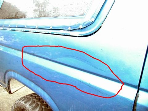 1985 Ford Bronco - Tree ding on the right rear fender.
