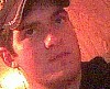 1994 Ford Bronco - A person's face is visible in this close-up shot, wearing a hat.