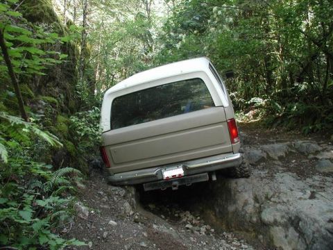 1985 Ford Bronco - He's wedged in there pretty good.