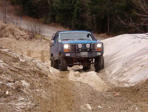 1985 Ford Bronco - Playing in a sand/gravel pit.