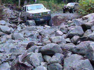 1985 Ford Bronco - Note the placement of the rock in front of Doug's bumper.