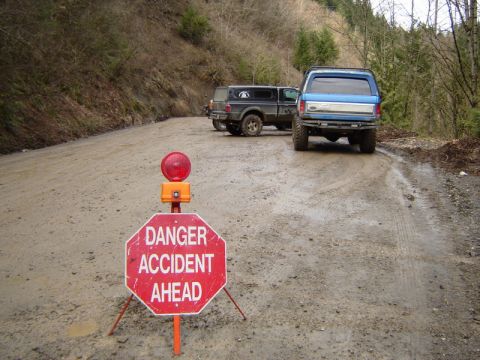 1985 Ford Bronco - A ways up the main road, a recovery crew had it blocked.