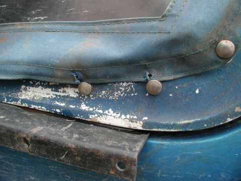 1985 Ford Bronco - On the way down Margret Creek Pass, I got to close to a tree and it ripped two snaps off of the soft top.