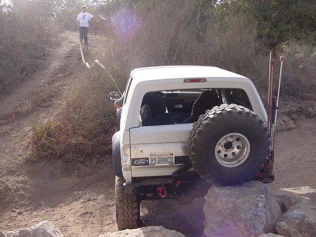 it was holding the truck up here. i rocked it back and forth to try to get off which caused the steel to tear. Couldnt get off so i had to be pulled uphill.