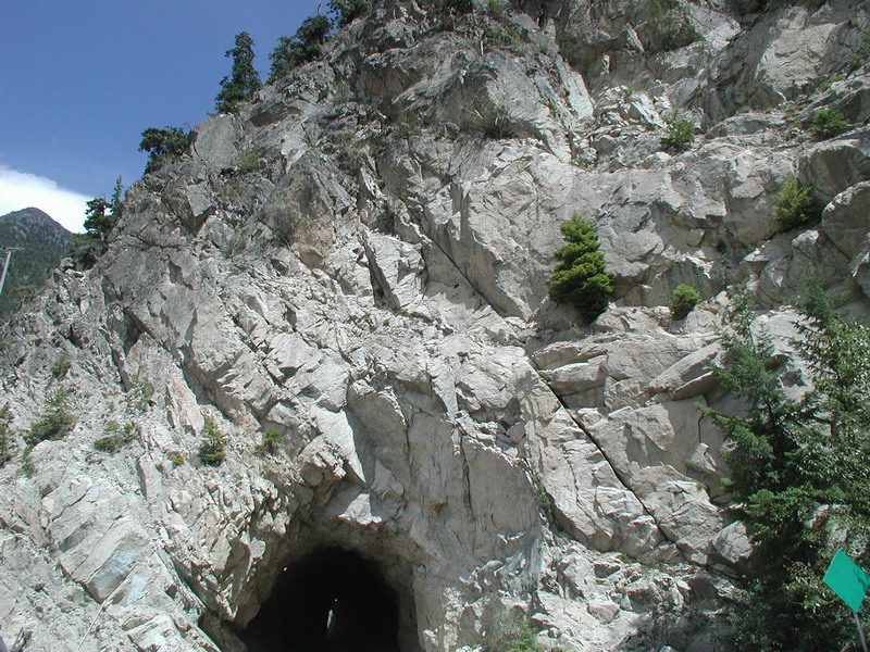 Tunnel entrance in a rocky mountainside