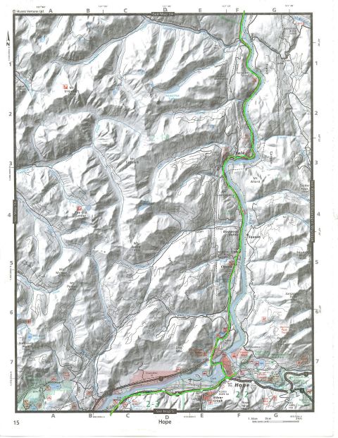 Topographic map showing a river and mountainous terrain with roads and trails.