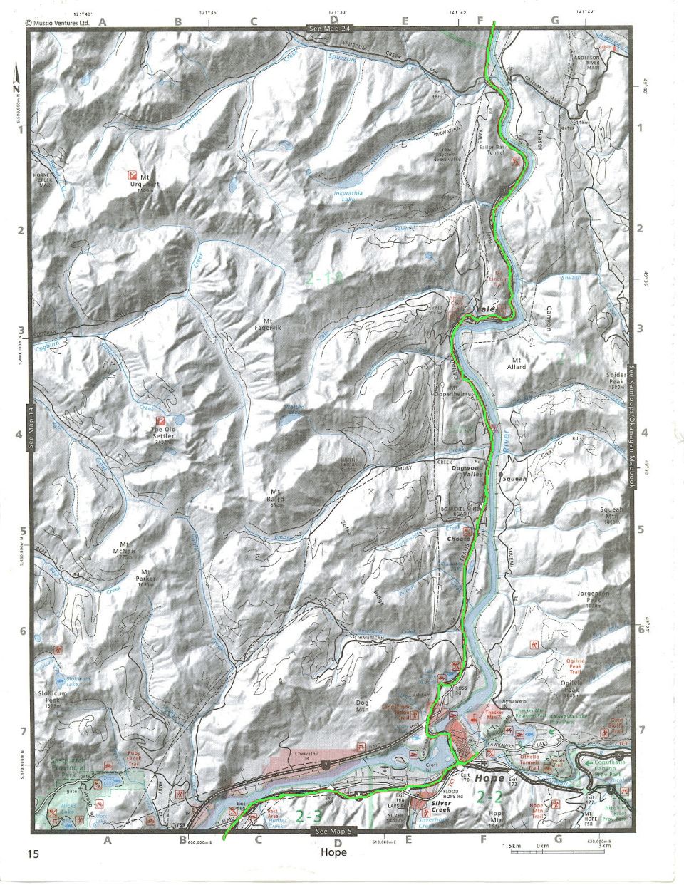 Topographic map showing a river and mountainous terrain with roads and trails.