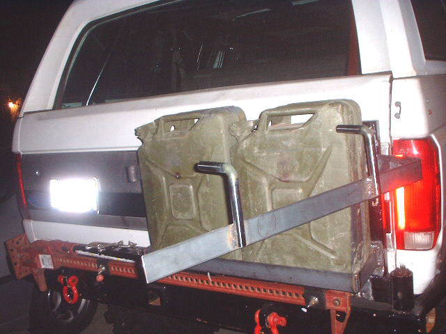 has a hinge and swings open. when its closed you can put a lock on it to keep it secure..