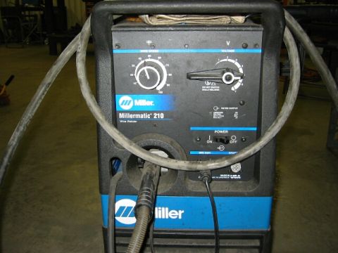 1994 Ford Bronco - Miller Millermatic 210 wire welder, a piece of equipment used for welding.
