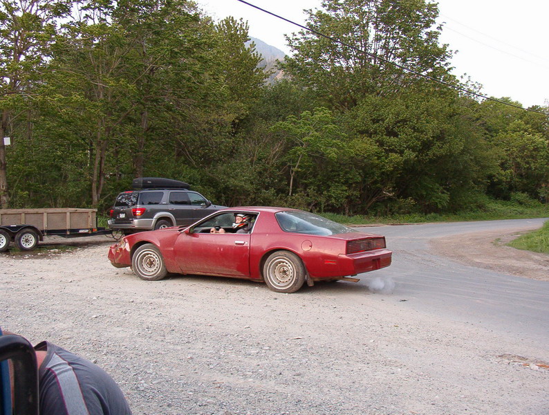 These four guys were getting ready to put the beat-down on this poor old Firebird. The driver came walking back a few minutes later as the battery had died.