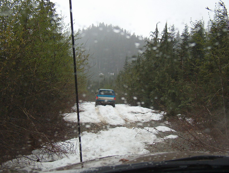 I tried to punch through; it was at least 12" deep.