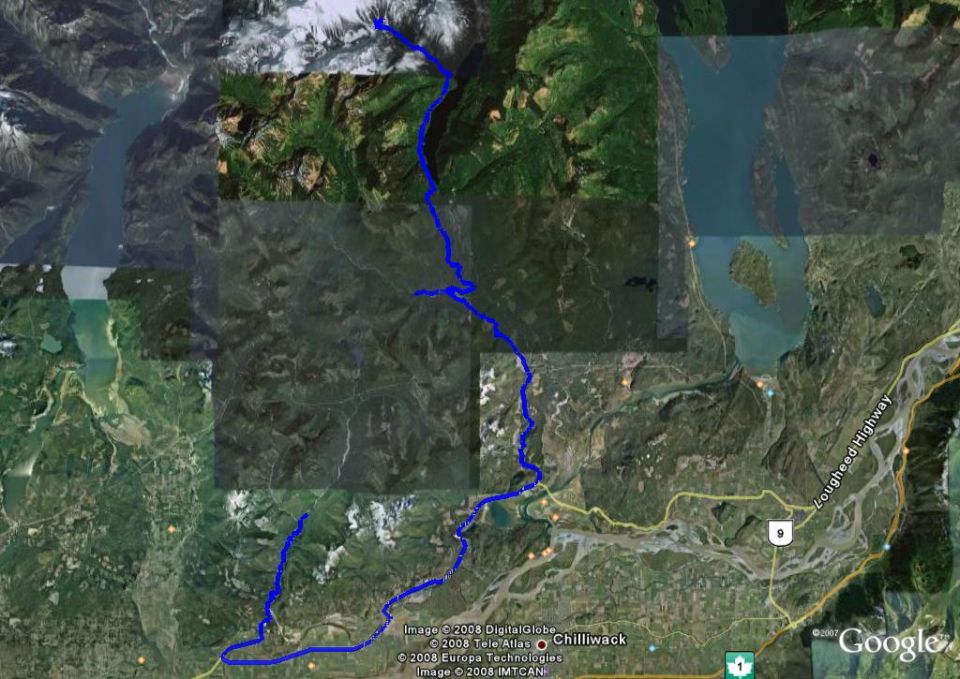 Satellite map showing a blue route through mountains and valleys.