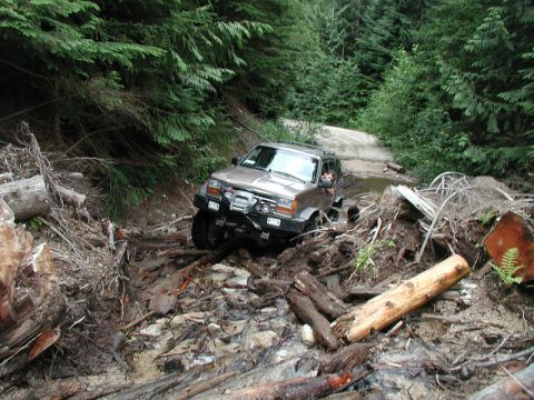 1985 Ford Bronco - This part was brutal as the logs were wet and traction was minimal.