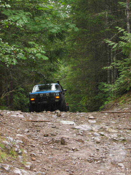 1985 Ford Bronco - We stopped here to lengthen the straps so we could go down the v-rock one at a time.