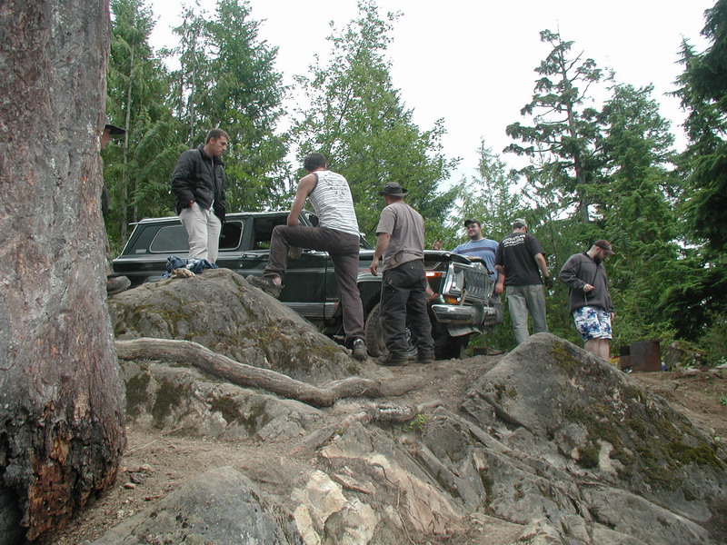 The gang checking out the damage.