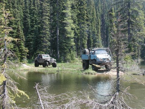 1985 Ford Bronco - The rest of the group rolled in about 10 minutes later, as Tim was towing Mike's front wheel drive only CJ through the hard stuff: