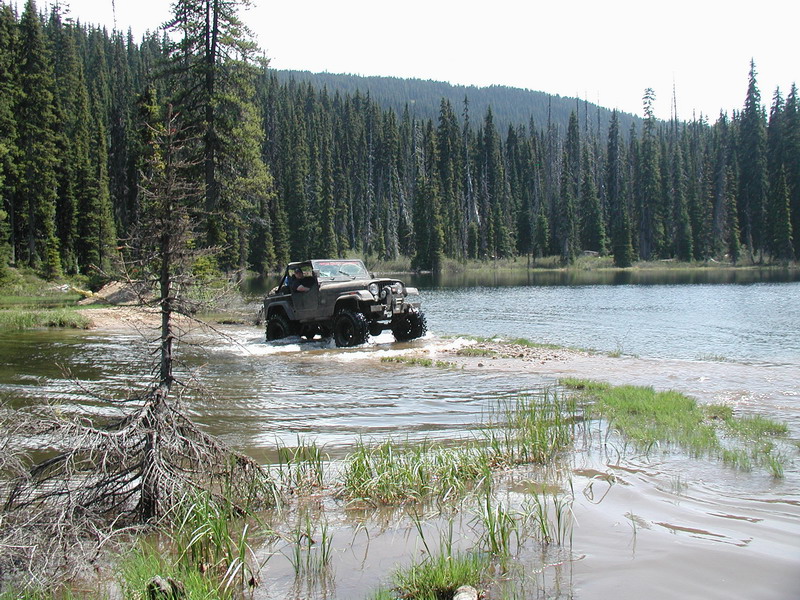 The rest of the group rolled in about 10 minutes later, as Tim was towing Mike's front wheel drive only CJ through the hard stuff: