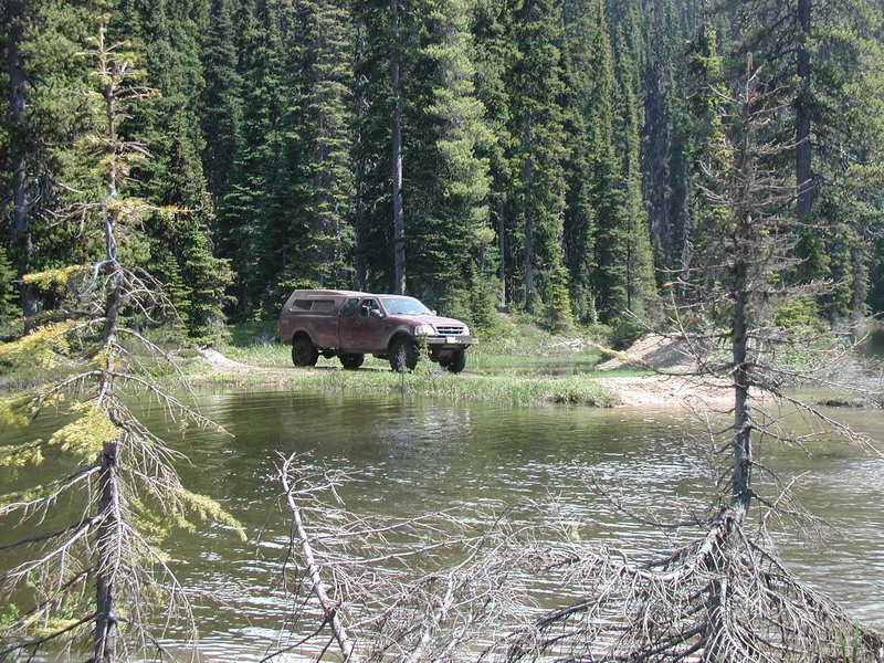 The rest of the group rolled in about 10 minutes later, as Tim was towing Mike's front wheel drive only CJ through the hard stuff: