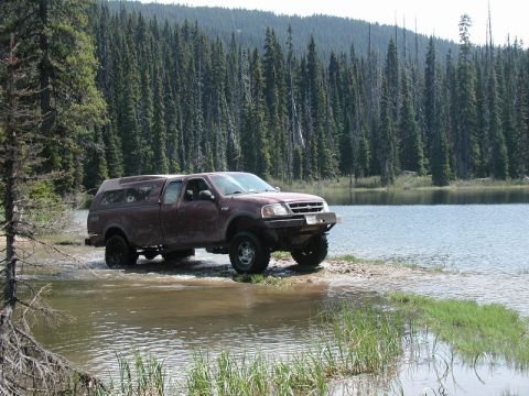 1985 Ford Bronco - The rest of the group rolled in about 10 minutes later, as Tim was towing Mike's front wheel drive only CJ through the hard stuff: