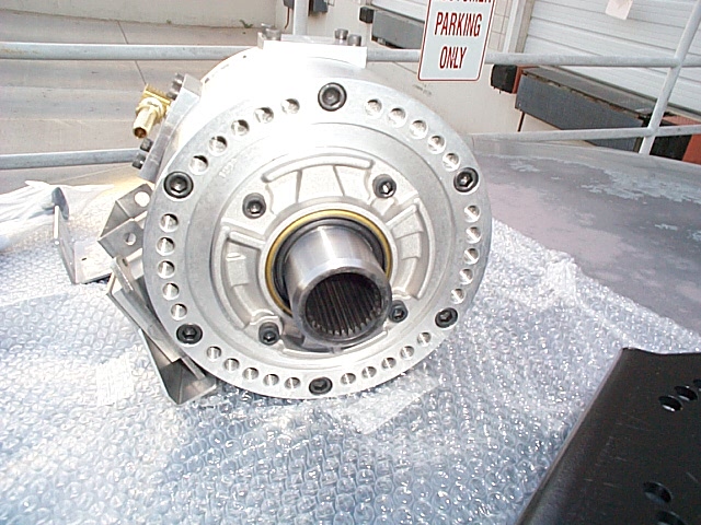 Aluminum transmission housing on bubble wrap showing splined output shaft