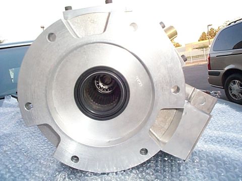1994 Ford Bronco - This is a close-up of a metal automotive part, possibly a hub or adapter, with visible splines.