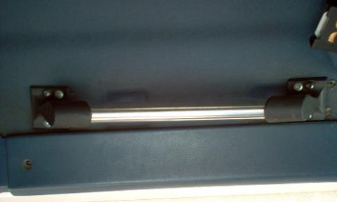 1988 Ford Bronco - Close-up of an interior grab handle, likely from a vehicle's cabin.