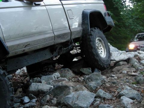 1985 Ford Bronco - Hi-centred on the rear diff. A couple of rocks under the tires and a good push and he was in the clear.