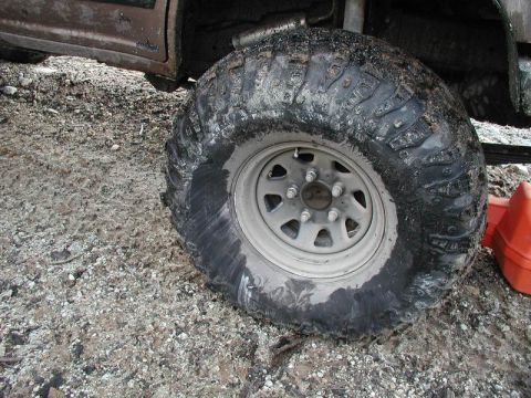 1985 Ford Bronco - Indir rubbed up against a large boulder.....