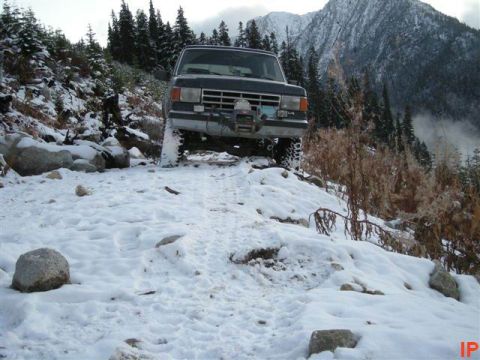 1985 Ford Bronco - We tied off the back or the truck, and Indir winched him out.