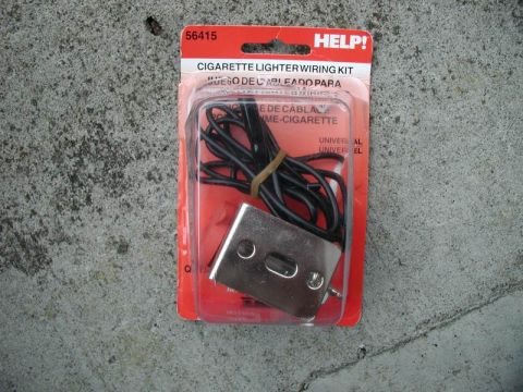 1990 Ford F-250 - A HELP! brand cigarette lighter wiring kit is displayed in its original packaging. The kit includes a metal socket and black wiring.