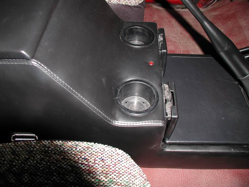 The broken drink holder was bugging me, so I got some super-glue and fixed it up.