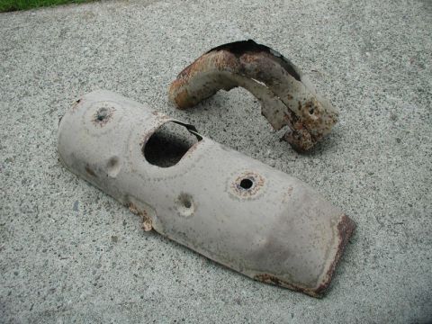 1990 Ford F-250 - Removed two rusted heat shields from the exhaust.