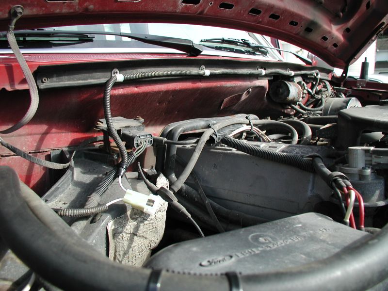 The previous owner tapped into the wiper motor harness for an ignition source for the brake controller; I removed the controller and re-used the connector for my voltmeter.