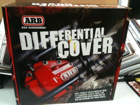 1990 Ford F-250 - A box for an ARB differential cover is shown. The box features a red differential with the ARB logo and text that reads "DIFFERENTIAL COVER…
