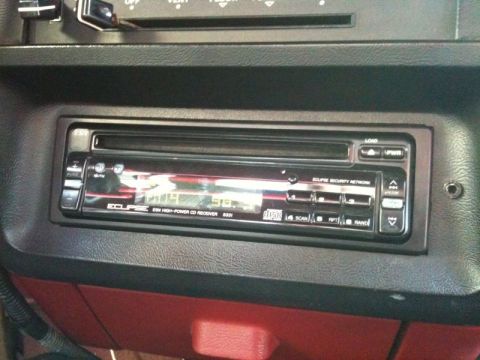 1990 Ford F-250 - The interior of a 1990 Ford F-250 shows a close-up of the car stereo, an Eclipse ESN High-Power CD Receiver, mounted in the dashboard.