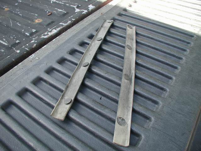They are held on with plastic push-pins.