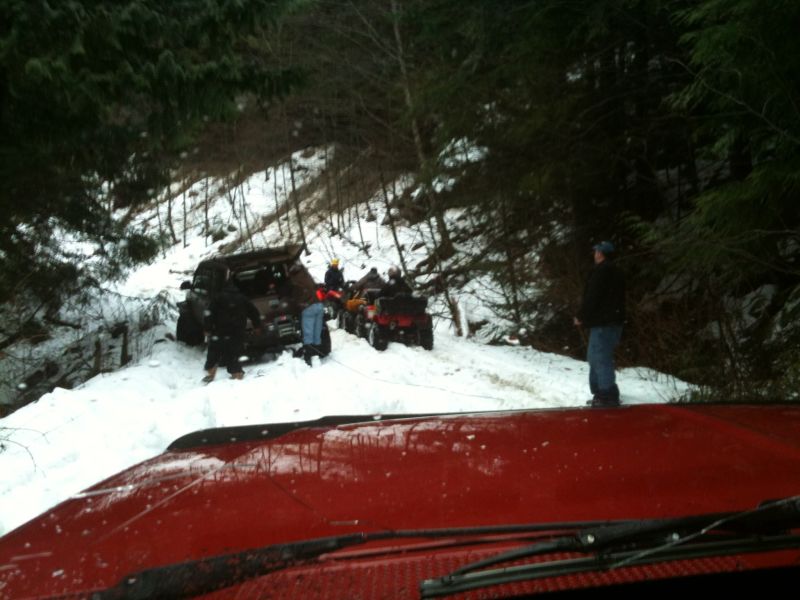 He broke the right inner D44 shaft, so we snatched and winched my rear end so I was back on track.