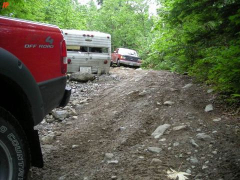 1990 Ford F-250 - It is not to often that you get to squeeze past an abandoned trailer on the trail.
