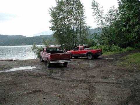 1990 Ford F-250 - Two red Ford's taking a quick break.