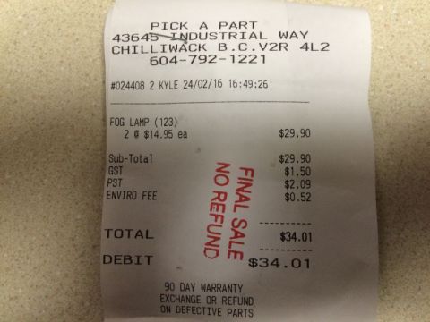 2002 Pontiac Grand Prix - This is a close-up of a retail receipt for a "FOG LAMP (123)". The receipt details the item cost, taxes, and total amount paid via debit.