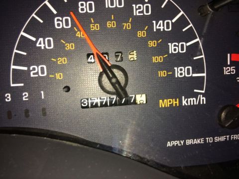 2002 Pontiac Grand Prix - The odometer of a vehicle shows 37777.7 miles and the speedometer needle is pointing just above 40 MPH.