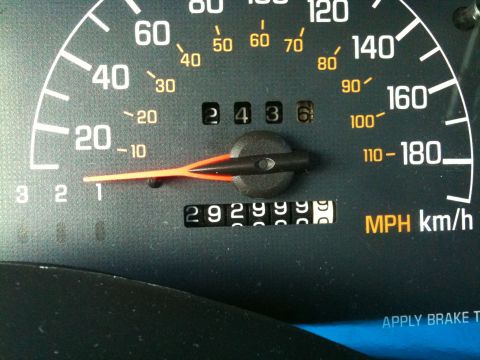 2002 Pontiac Grand Prix - The image shows a close-up of a car's dashboard, focusing on the speedometer and odometer. The speedometer needle is pointing slightly abov…
