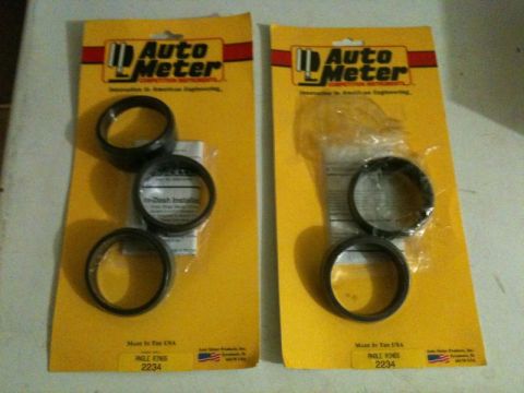 2002 Pontiac Grand Prix - Two packages of Auto Meter Angle Rings, part number 2234, are displayed on a yellow backing card. Both packages contain three black rings e…