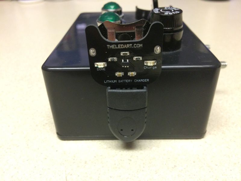 USB battery charger from theledart.com, with a USB cable end for a holder.