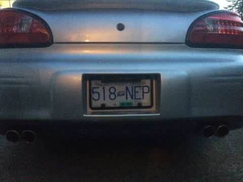 2002 Pontiac Grand Prix - Dusk shot, license light off. The frame is sitting a tad crooked.