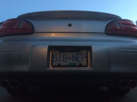 2002 Pontiac Grand Prix - Dusk shot, license light off. The frame is sitting a tad crooked.